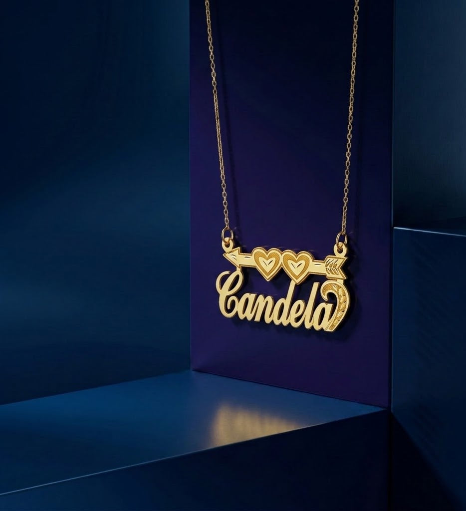 Personalized statement nameplate necklace with romantic heart-and-arrow design, high-end custom jewelry by CustomGolds INC showcasing detailed handcrafted elegance and modern shine