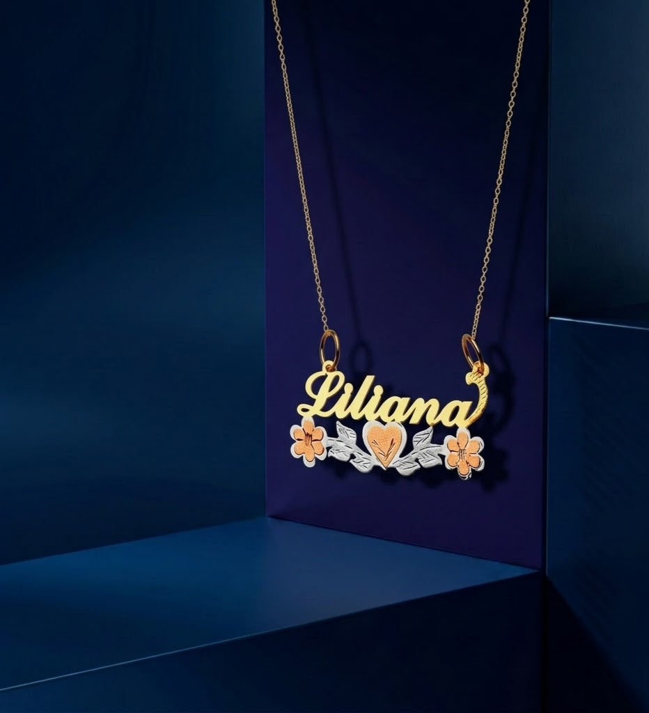 Handcrafted name pendant with floral heart design, premium custom jewelry from Los Angeles featuring polished 18k gold and custom engraving in a script font style.