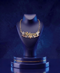 Custom 3D name necklace in multi-tone 14k and 18k solid gold featuring birds and heart details, handcrafted fine jewelry by CustomGolds INC with a high-polish luxury finish.