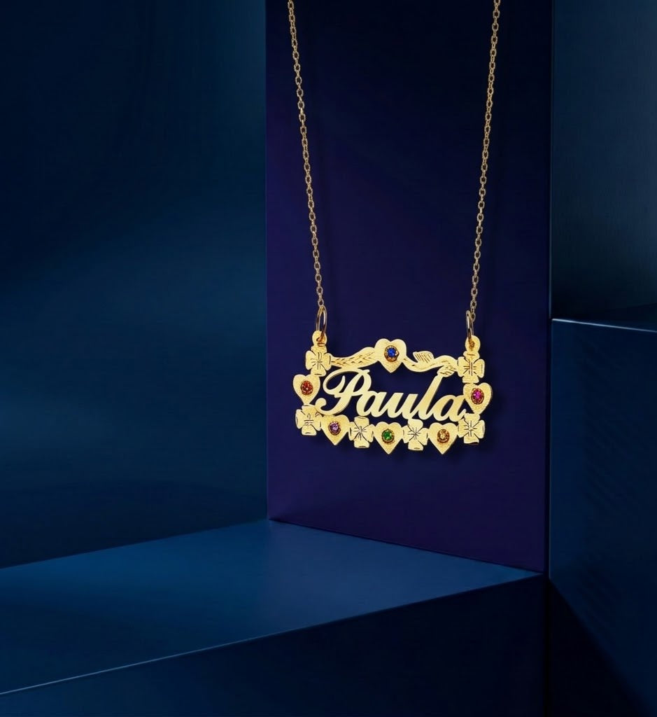 Luxury custom gold lettering name necklace featuring floral heart pendant design, handcrafted personalized jewelry in yellow gold with soft satin finish and refined bespoke craftsmanship
