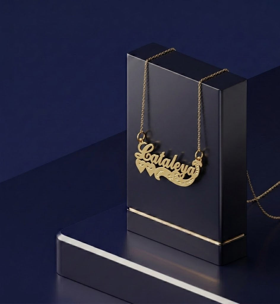 Premium custom name necklace with faceted heart detailing, master jeweler handcrafted 14k gold jewelry aesthetic, and signature bespoke jewelry piece for meaningful gifting