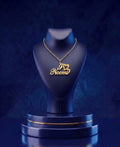Personalized script name necklace with custom nameplate, available in 18K solid gold or sterling silver, featuring raised handcrafted gold lettering from CustomGolds INC