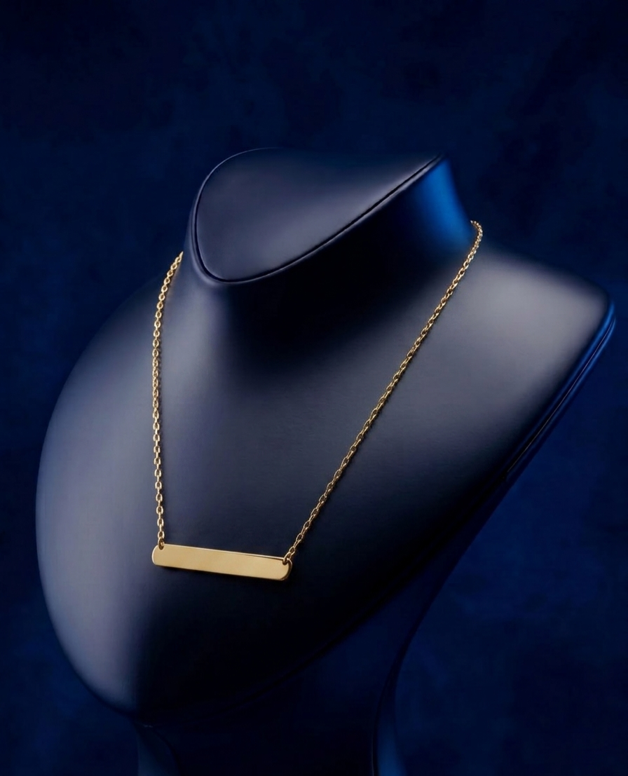 Premium engraved name necklace with custom nameplate pendant, crafted in pure yellow gold with soft satin finish, delicate bespoke jewelry designed in Los Angeles by CustomGolds INC.