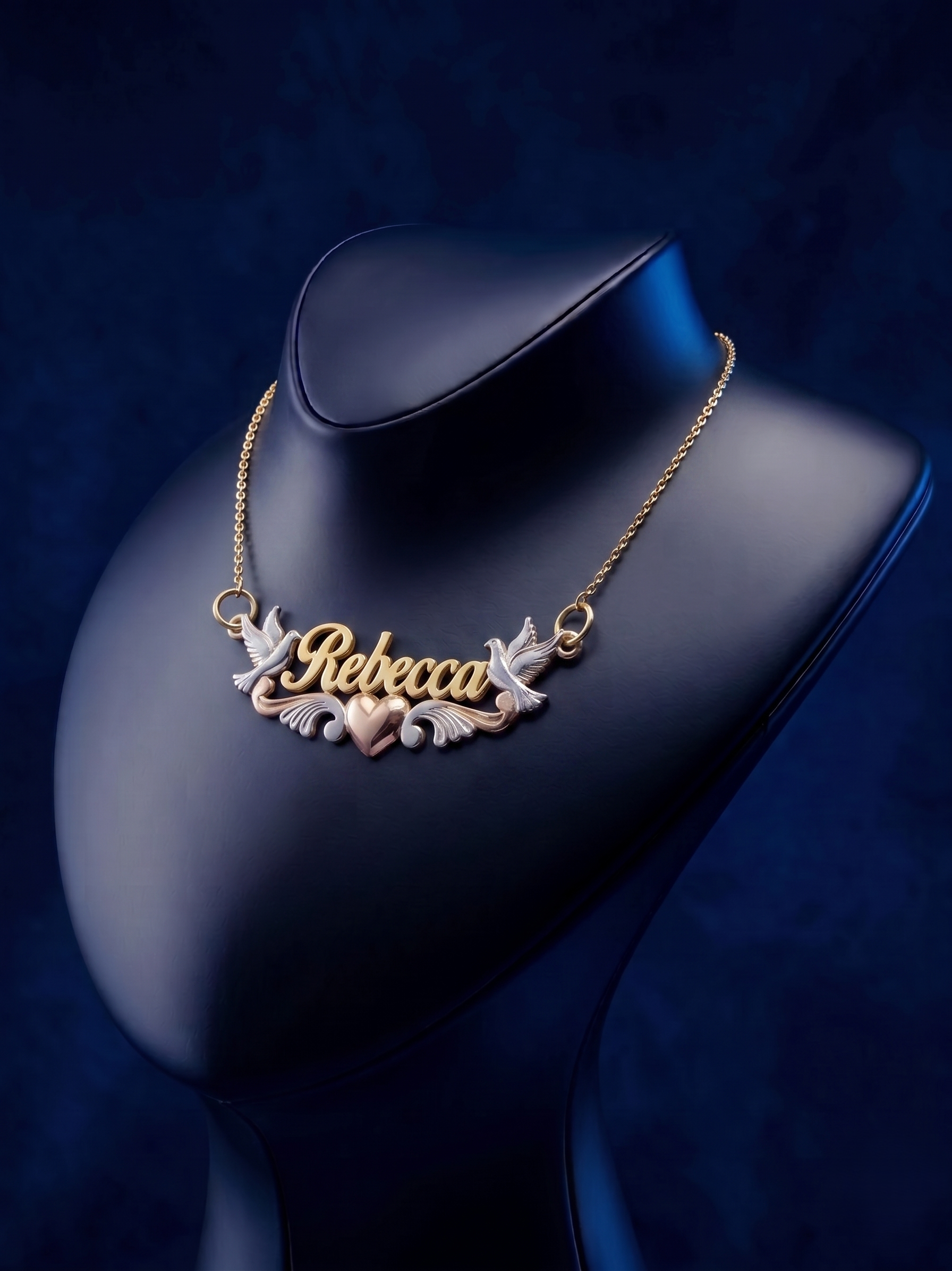 Personalized gold nameplate necklace with script lettering, crafted in yellow 18k solid gold, designed as a bespoke fine jewelry piece with soft satin and polished accents.