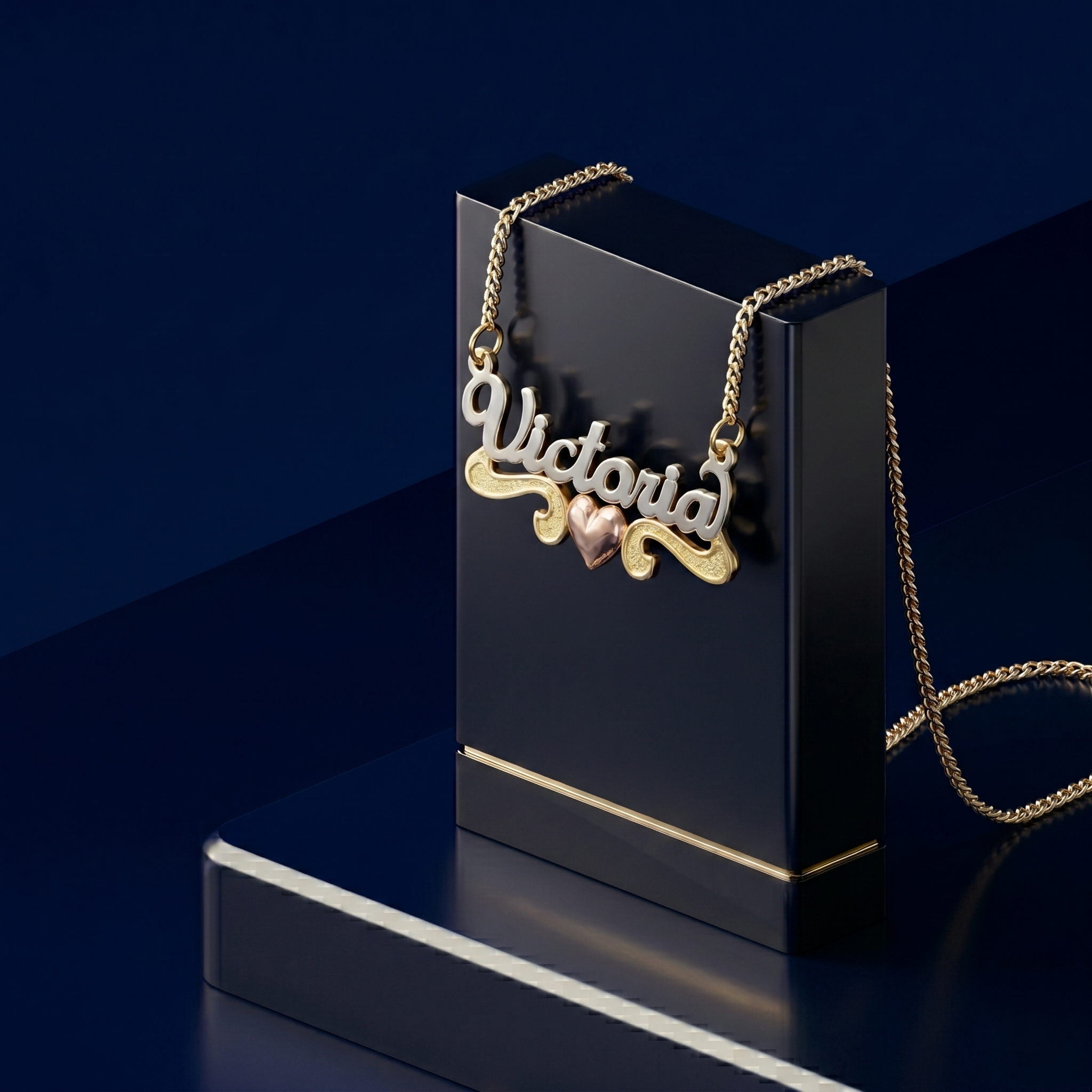 Bespoke custom gold nameplate pendant with layered 3D lettering and romantic heart accent, premium personalized jewelry crafted with signature satin finish and cable chain.