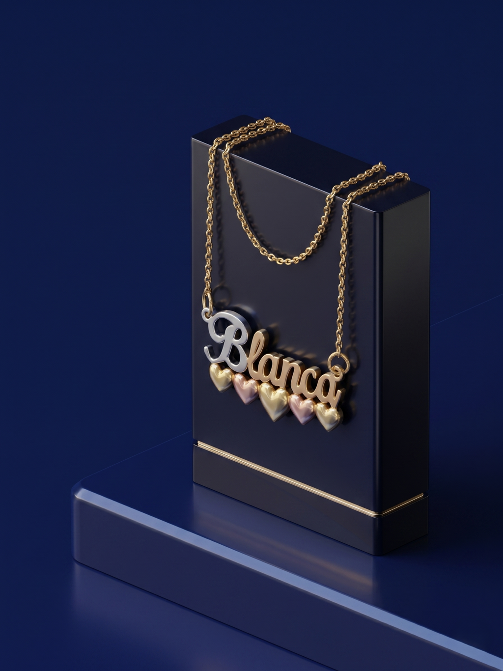 Handcrafted personalized nameplate necklace featuring custom gold lettering and heart details, premium yellow gold jewelry with high-shine finish and bespoke craftsmanship from Los Angeles.