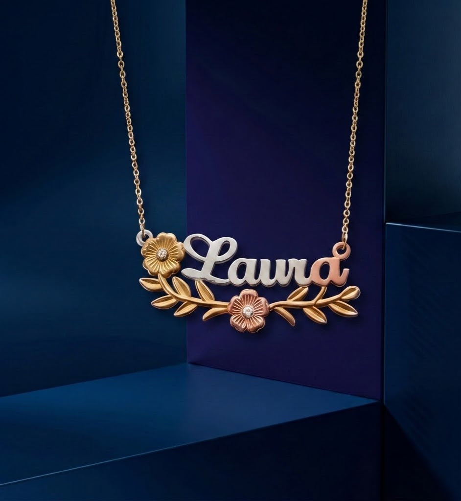Luxury bespoke 3D name necklace with nature-inspired flower and leaf elements, smooth polished gold finish, signature custom jewelry piece from Los Angeles studio