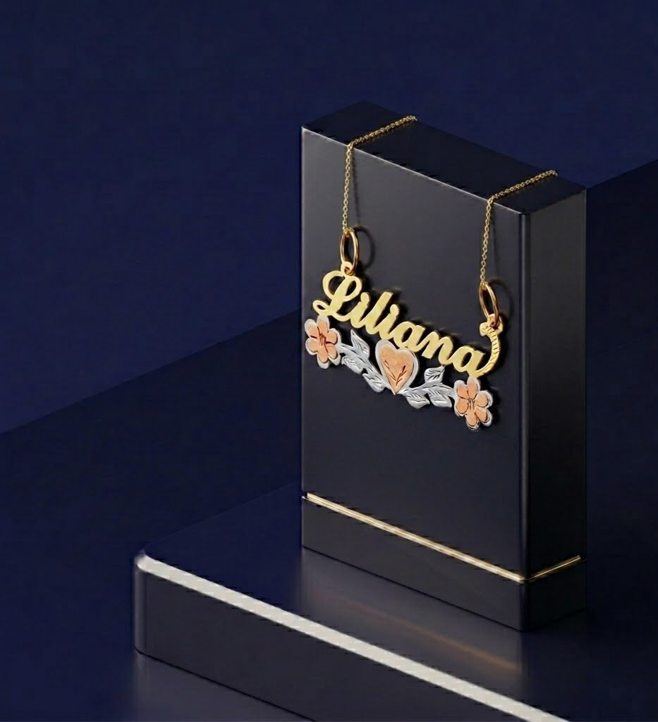 Luxury gold name necklace with tri-color design, refined floral heart details and custom typography, created as a high-end bespoke jewelry gift by CustomGolds INC.