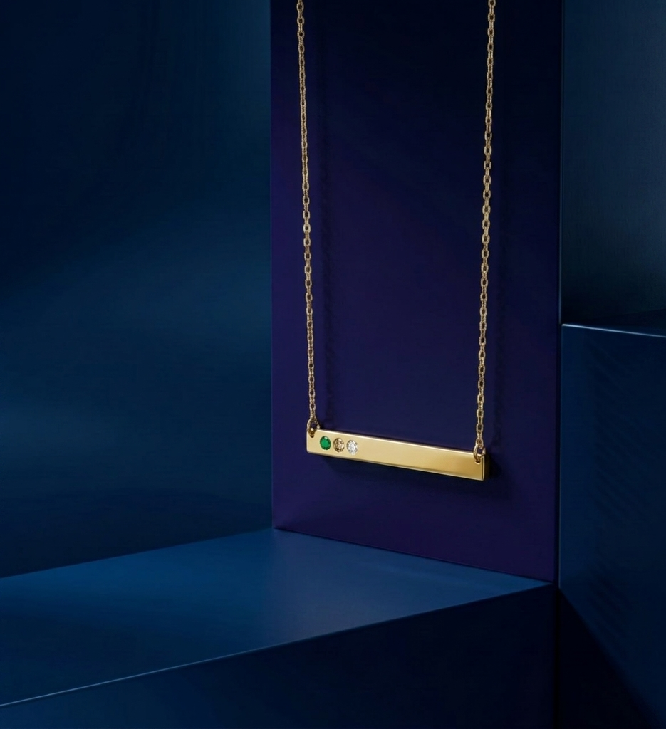 Handcrafted gold pendant with three gemstone details, a signature handcrafted gold pendant in yellow gold combining modern minimalism with luxury personalized design by CustomGolds INC