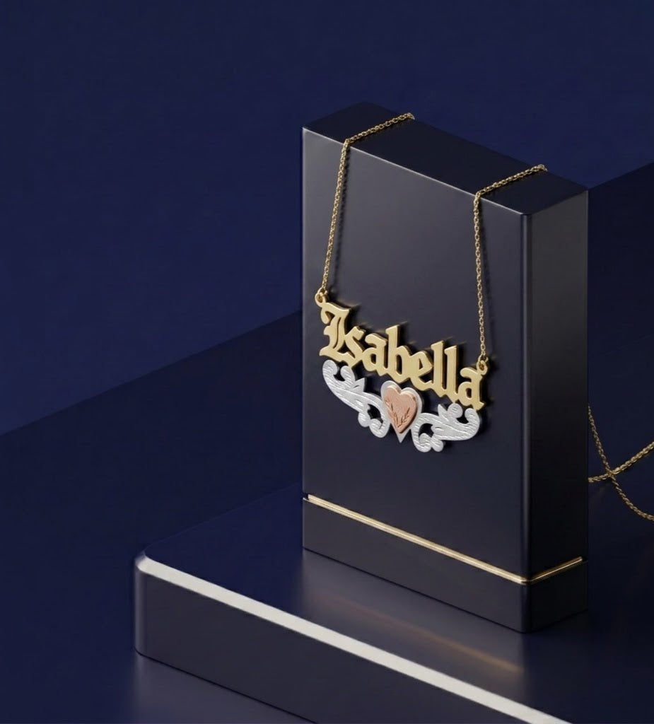 Elegant personalized gold name necklace with layered tri-color metal design, soft-polish satin finish, and custom gold lettering, crafted as fine Los Angeles jewelry for a timeless luxury statement.