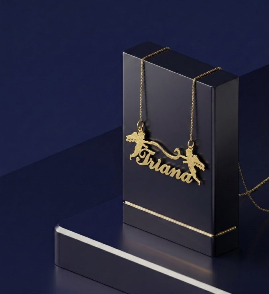 Luxury angel design custom name necklace featuring handcrafted gold pendant, personalized script nameplate, and signature CustomGolds INC craftsmanship in yellow gold.