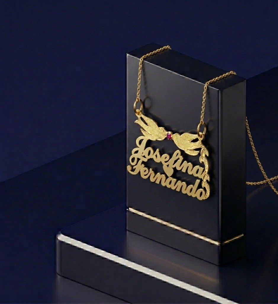 Personalized two-name necklace with Lovebirds symbol and red ruby accent, crafted in premium gold with a delicate design inspired by love and connection