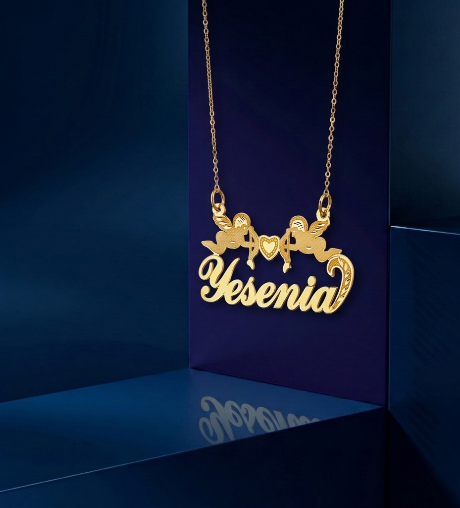 Bespoke Los Angeles fine jewelry nameplate pendant featuring romantic cherub detailing, script name design, and signature high-polish luxury custom finish.