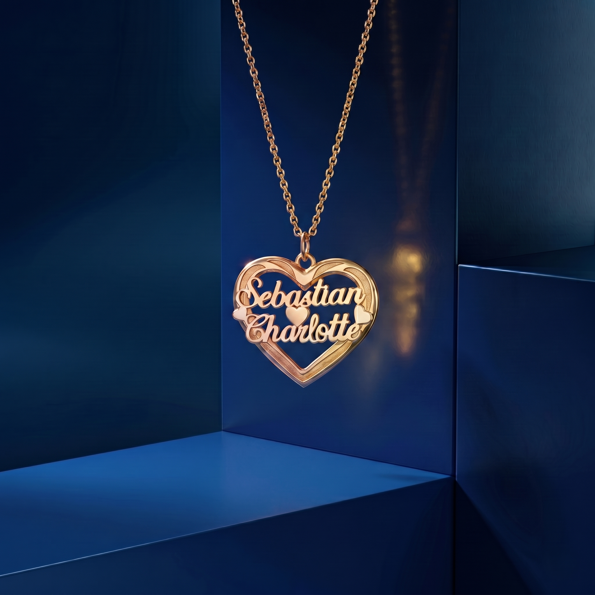 Elegant custom gold nameplate pendant with two-name personalization, crafted in 18k gold with a luxury high-polish finish and master jeweler craftsmanship.
