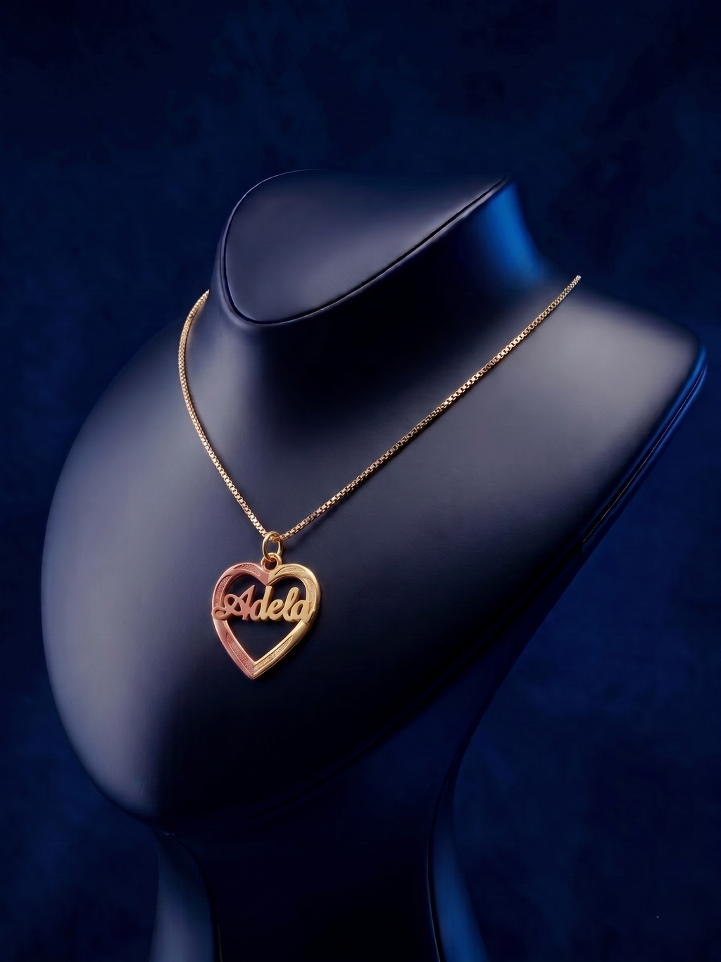 Custom 3D name necklace featuring a multi-tone gold heart, premium handcrafted nameplate jewelry in yellow gold and sterling silver with elegant script engraving and luxury finish.