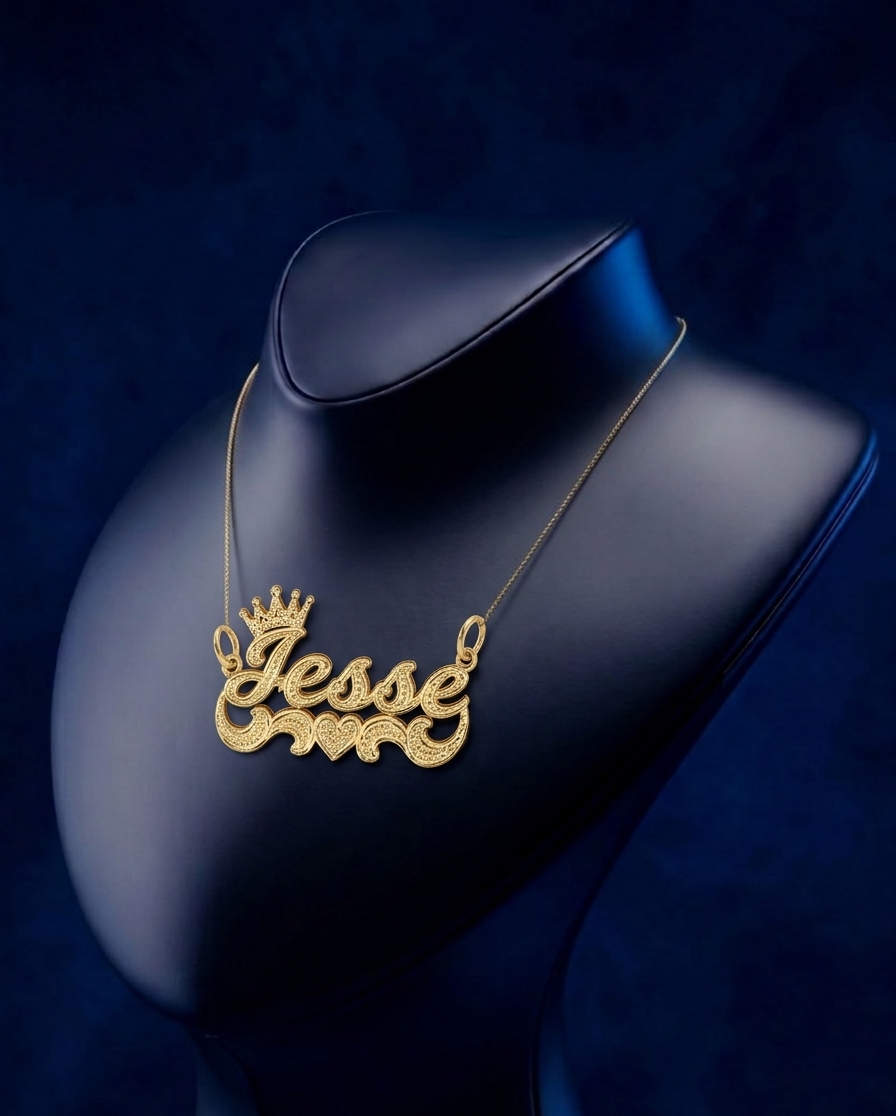 14K gold personalized nameplate pendant featuring crown and heart details, bespoke fine jewelry piece handcrafted in Los Angeles by CustomGolds INC with premium artisan finishing