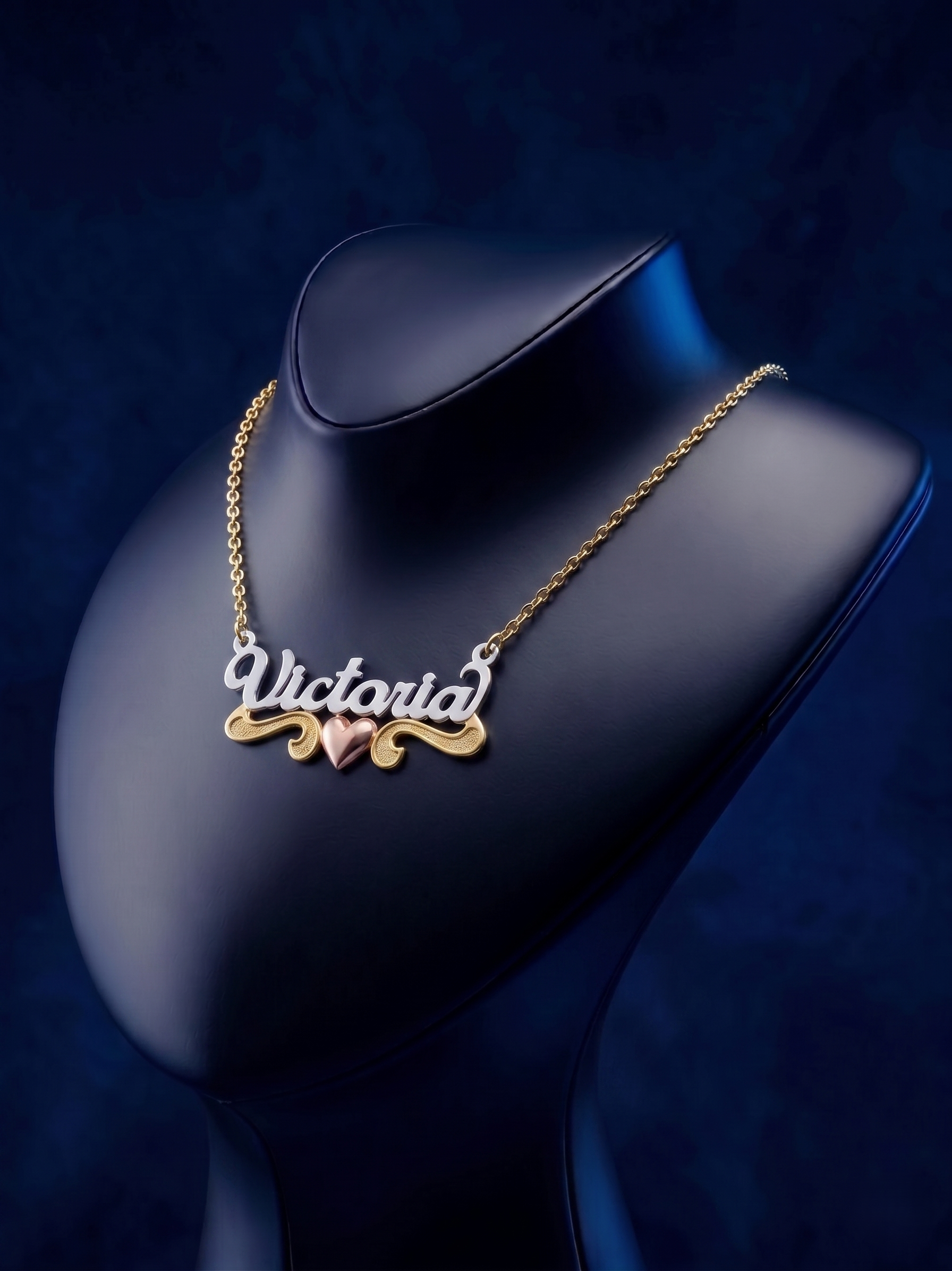 Personalized tricolor gold name necklace with delicate heart detail, luxury handcrafted pendant in high-polish 18k solid gold style by Los Angeles fine jewelry artisans.