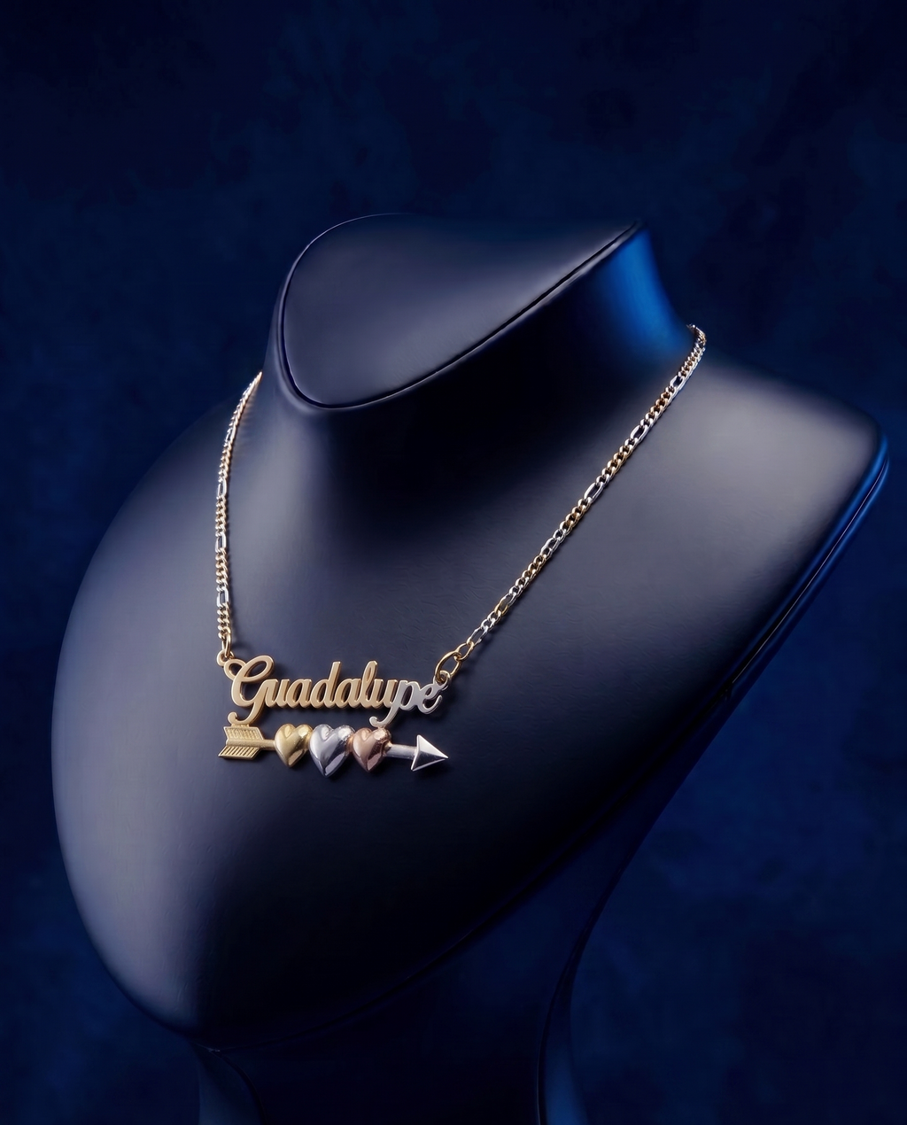 Handcrafted script name necklace with yellow gold, white gold, and rose gold heart accents, luxury personalized jewelry made by master jewelers in Los Angeles.
