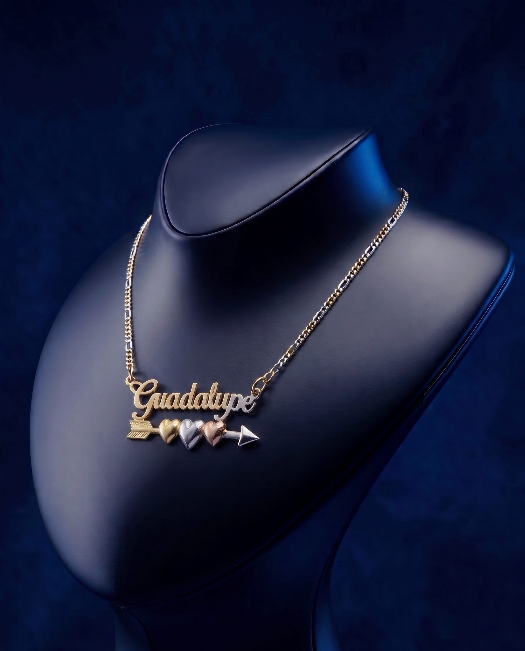 Handcrafted script name necklace with yellow gold, white gold, and rose gold heart accents, luxury personalized jewelry made by master jewelers in Los Angeles.