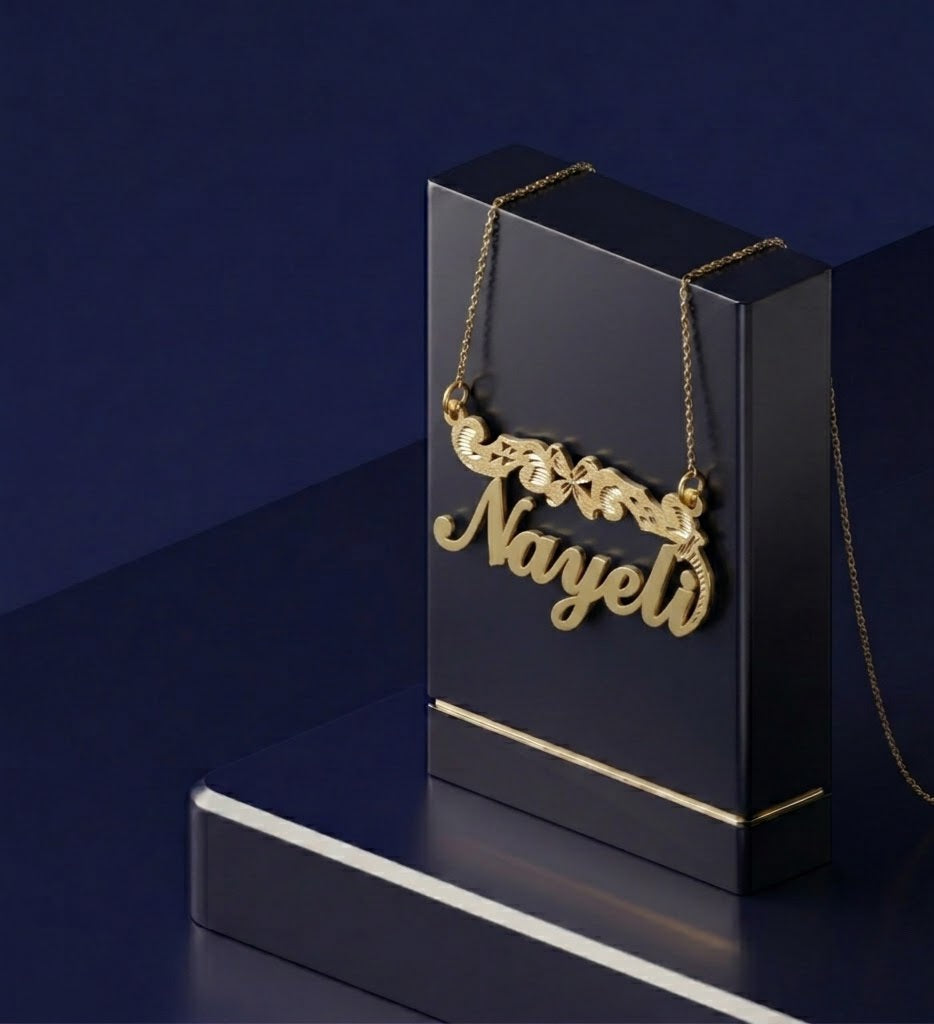 Handcrafted name necklace with soft satin polish finish and custom gold lettering, designed as a unique personalized fine jewelry piece for everyday elegance.