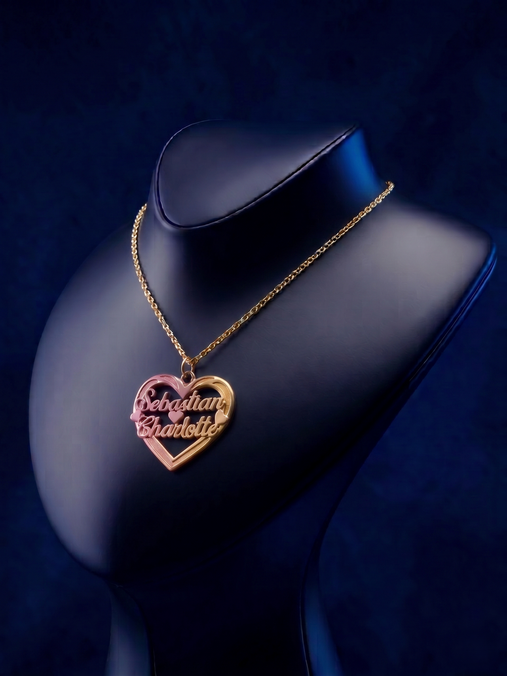Luxury personalized 14k gold heart pendant with dual-name engraving, bespoke custom jewelry piece designed in Los Angeles with soft-polish satin detailing.