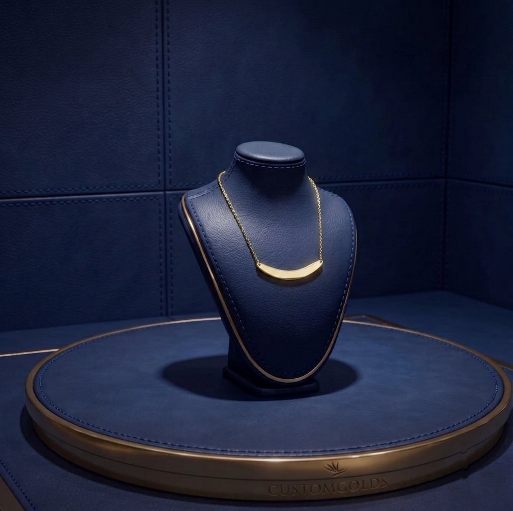 Luxury curved bar necklace in solid gold with a distinctive modern design, inspired by contemporary fine jewelry aesthetics, handcrafted by CustomGolds INC