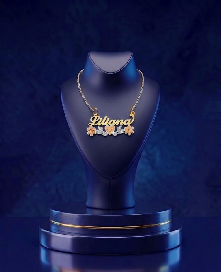 Personalized tri-color gold name pendant with floral heart design, a luxury handcrafted fine jewelry piece with a high-polish 18k gold finish and elegant engraved name by CustomGolds INC.