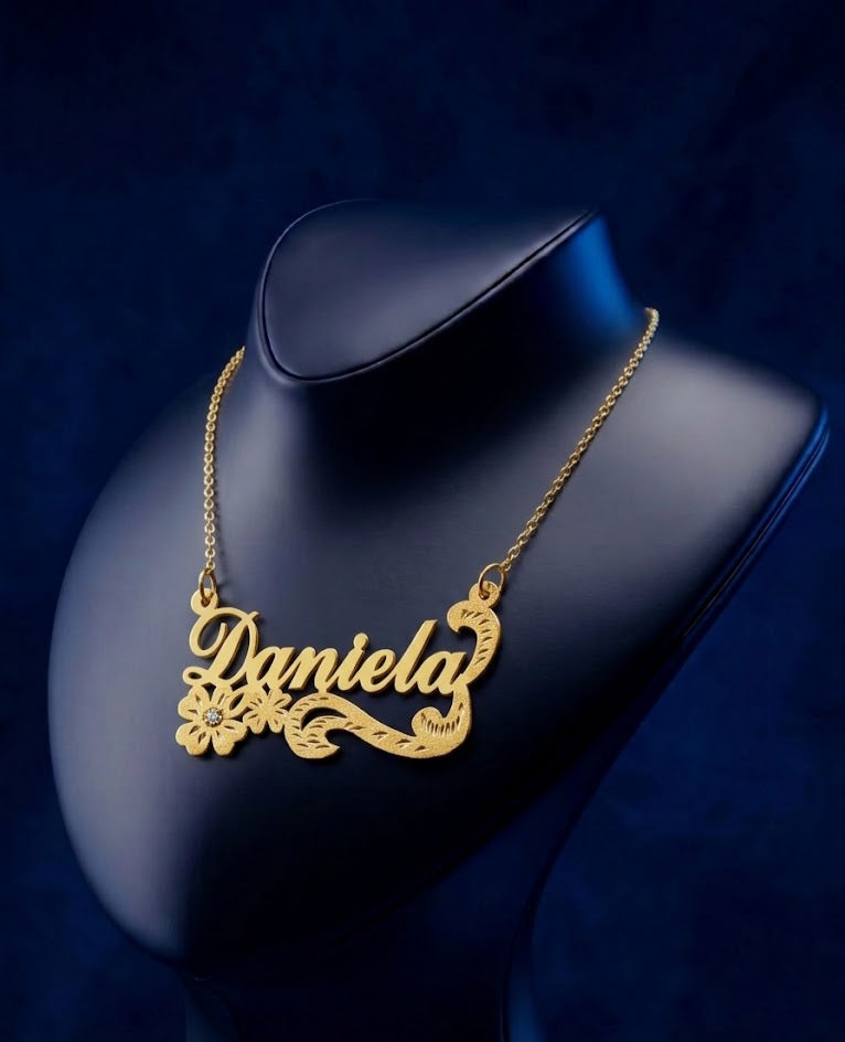 Bespoke custom name necklace featuring floral accents and soft-polish finish, made in 925 sterling silver with elegant handcrafted detail from Los Angeles studio.