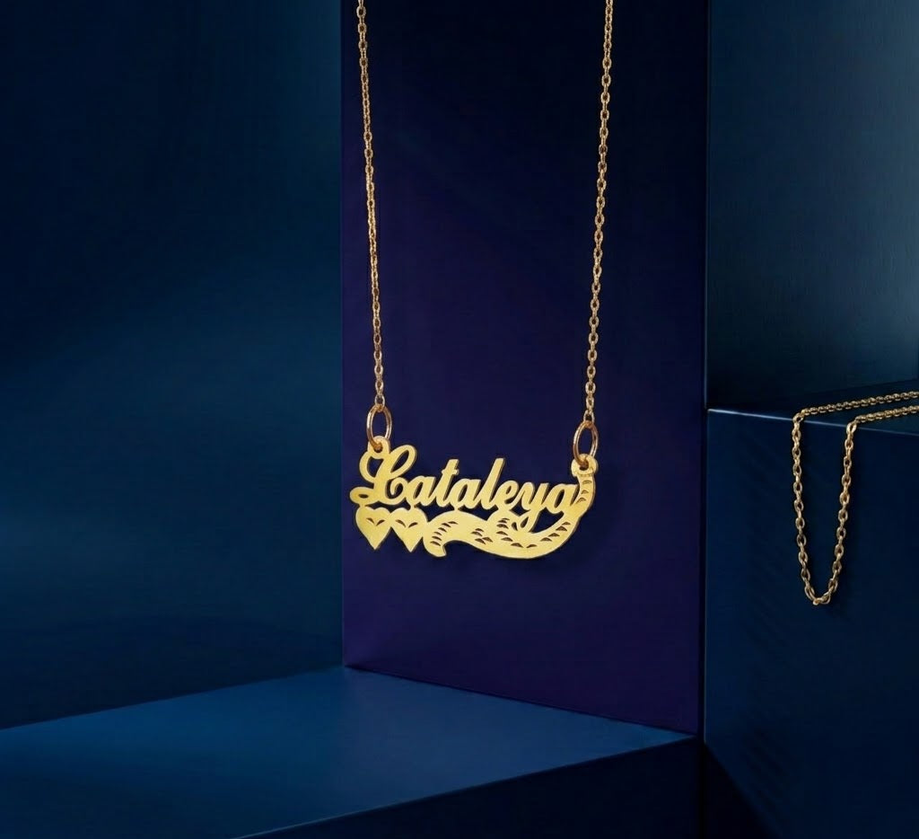 Luxury personalized nameplate pendant featuring custom gold lettering, soft-polish satin finish, and handcrafted yellow gold design inspired by Los Angeles fine jewelry craftsmanship