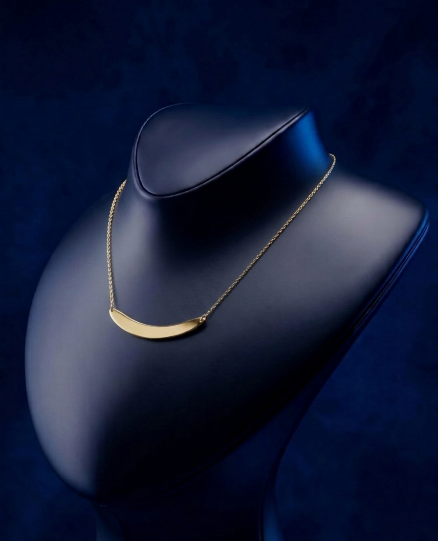 Curved name necklace in 18k solid gold with high-polish finish and refined modern detailing, a premium fine jewelry piece by CustomGolds INC