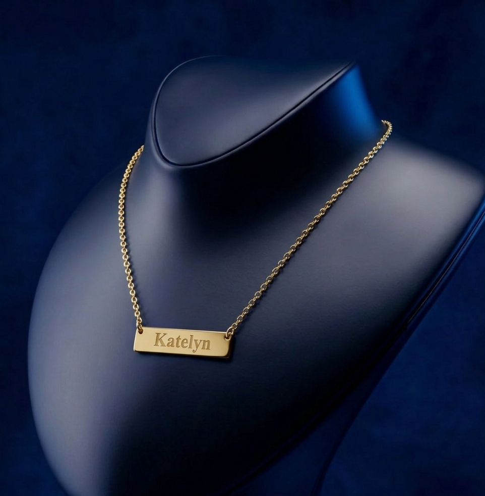 Modern handcrafted gold horizontal pendant necklace featuring personalized name engraving and refined minimalist design by CustomGolds INC