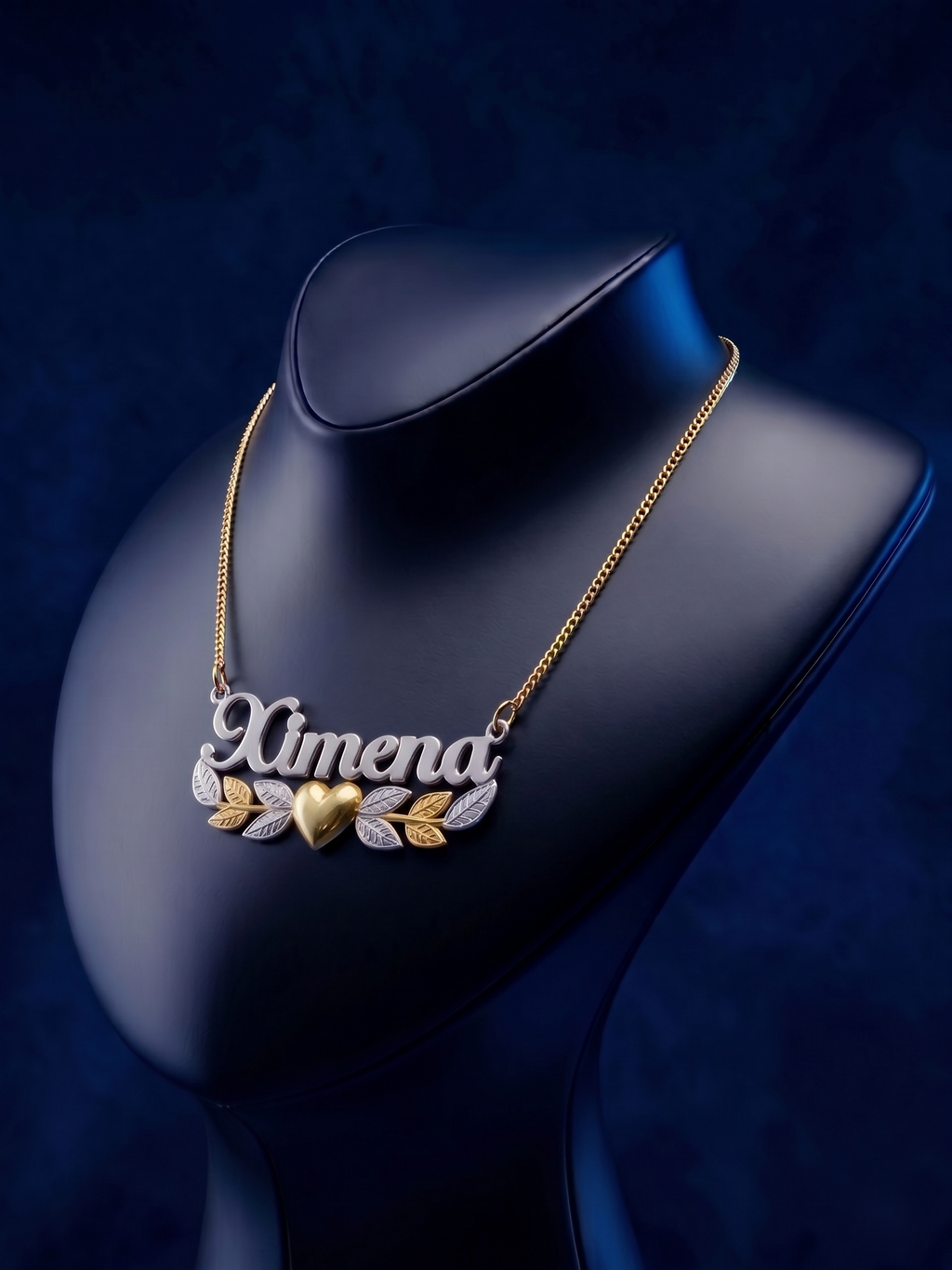 Luxury custom nameplate necklace featuring a romantic heart and leaf design in multi-tone gold, handcrafted in Los Angeles with premium 18k gold detailing and bespoke craftsmanship.