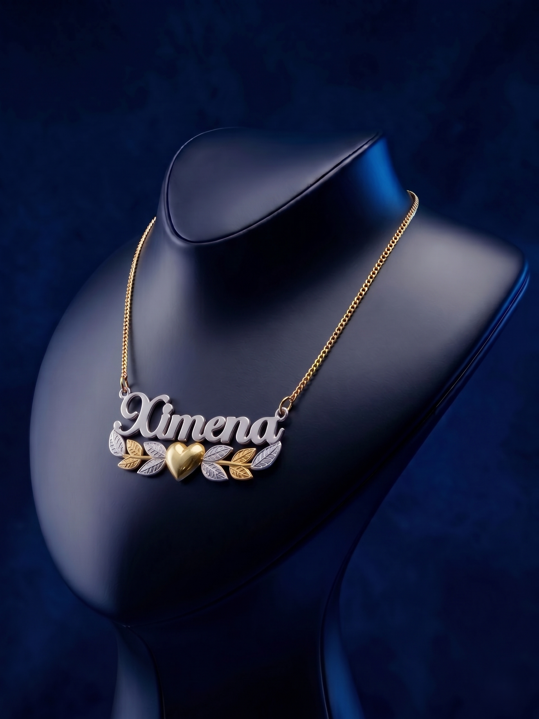 Luxury custom nameplate necklace featuring a romantic heart and leaf design in multi-tone gold, handcrafted in Los Angeles with premium 18k gold detailing and bespoke craftsmanship.