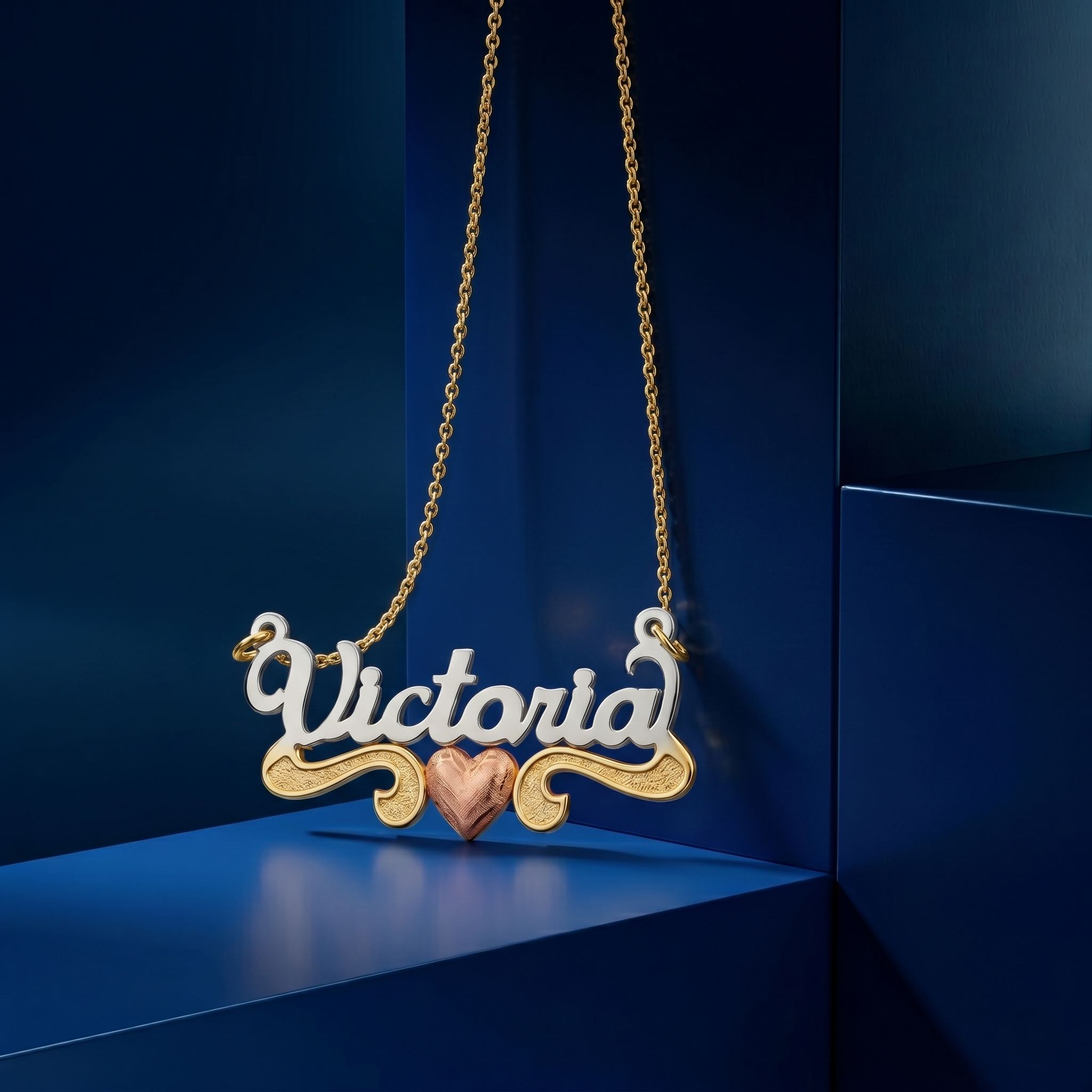 Elegant script name necklace with tricolor gold tones and custom lettering, master jeweler handcrafted luxury personalized gift with refined soft-polish finish.