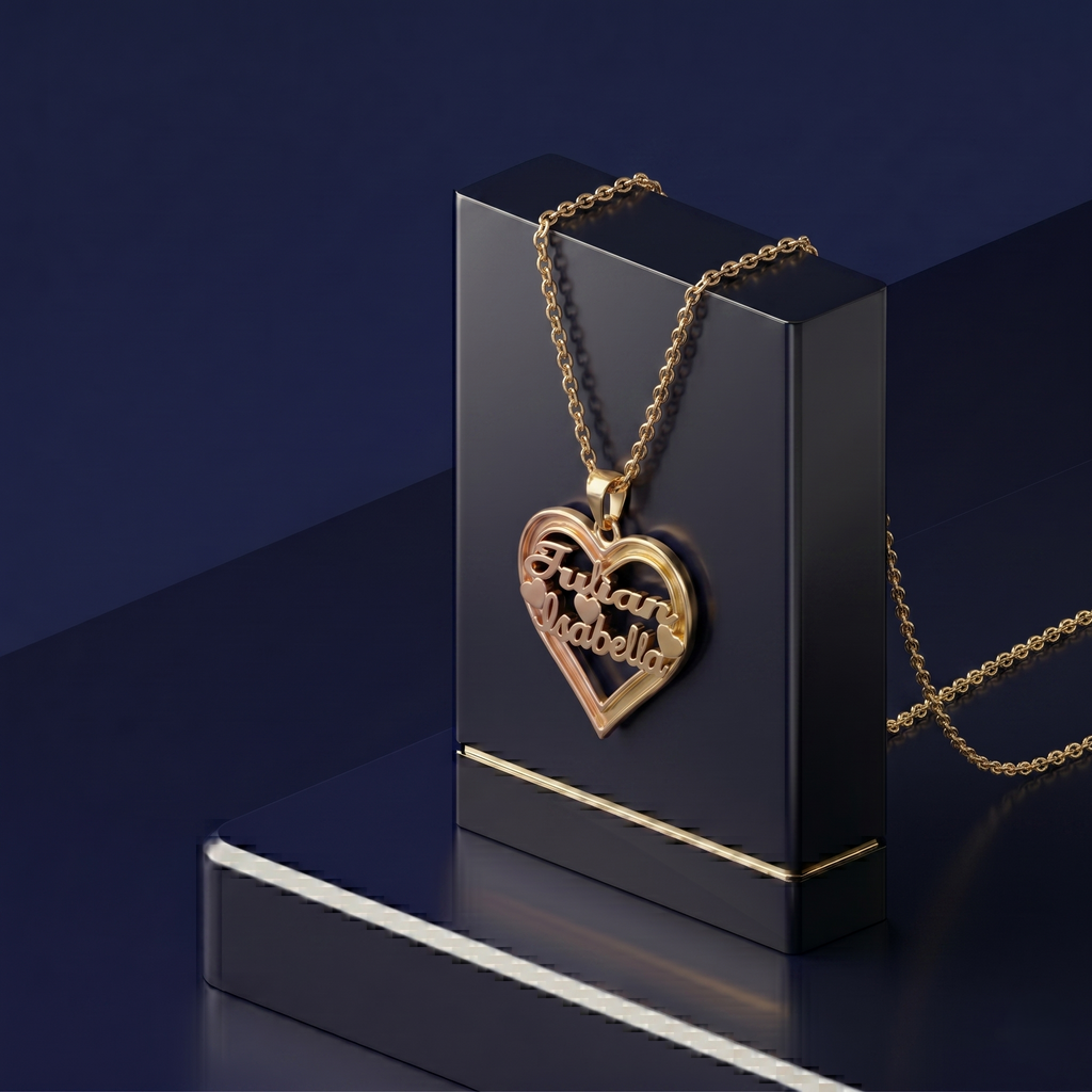 Luxury custom name necklace featuring intertwined two names inside a sculpted heart, handcrafted yellow gold jewelry with soft-polish satin and high-shine finish, designed in Los Angeles fine jewelry studio.
 